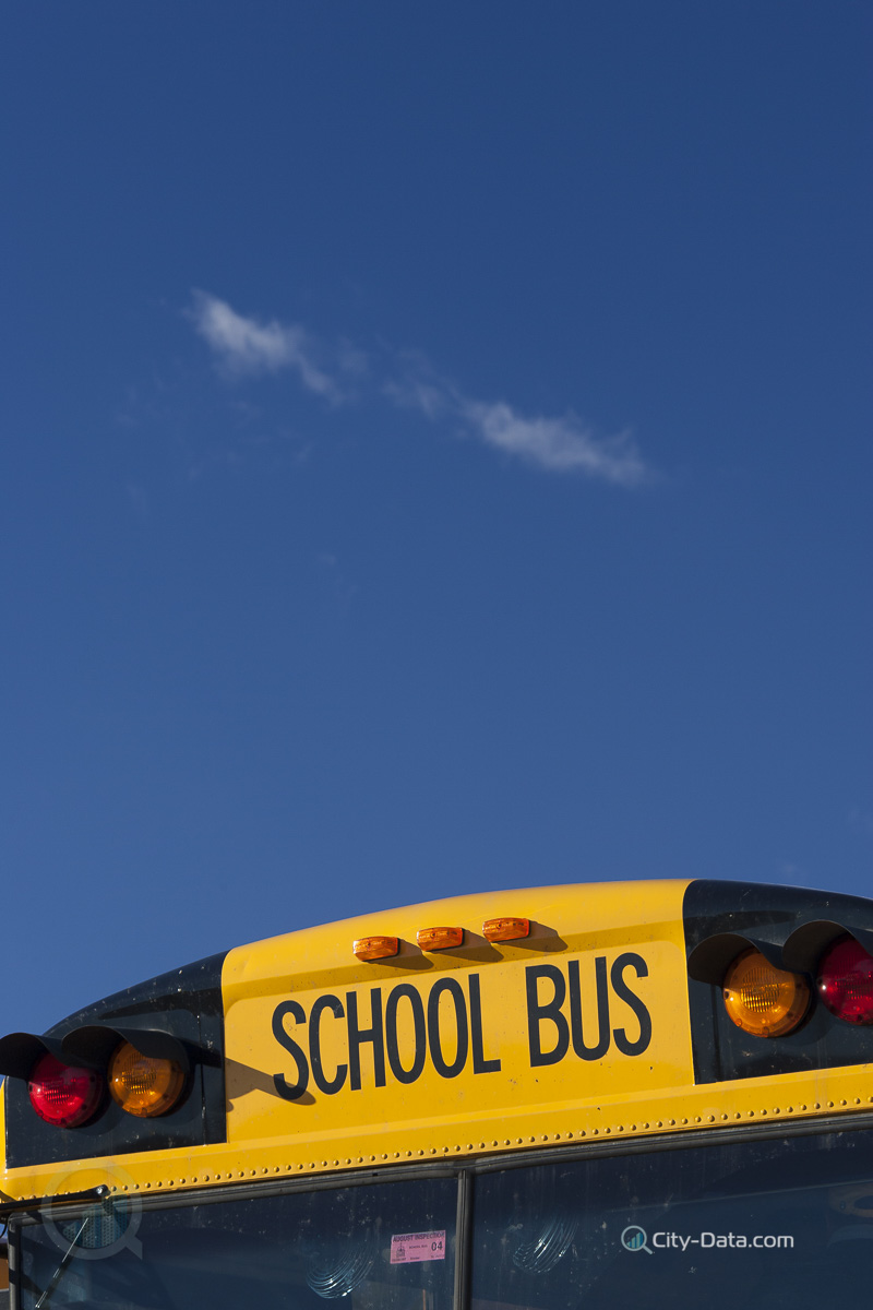 School bus and blue sky, stowe, vermont, usa
